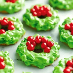 Colorful wreath cookies decorated with icing and sprinkles for festive occasions